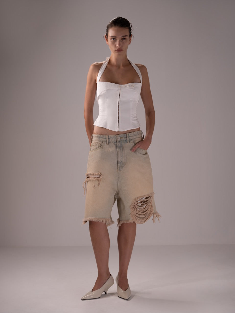 RIPPED BERMUDA SHORTS